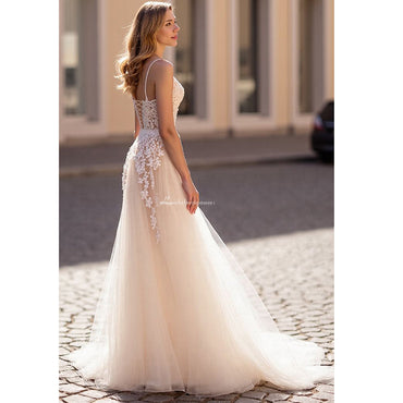 Abiti da sposa senza spalline Una linea profonda scollo a V Abiti da sposa Applique in pizzo Cerniera posteriore Illusion