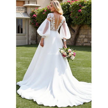 Robe de mariée trapèze en mousseline de soie ivoire avec traîne courte et appliques en dentelle