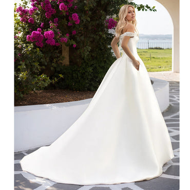 Robe de mariée à épaules dénudées avec poche Robes de mariée trapèze en satin