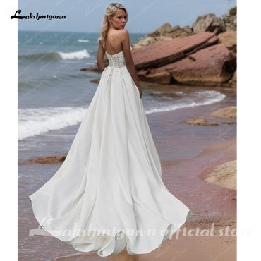 Abiti da sposa sexy in raso con spacco laterale 2025 Abiti da sposa da spiaggia per donna