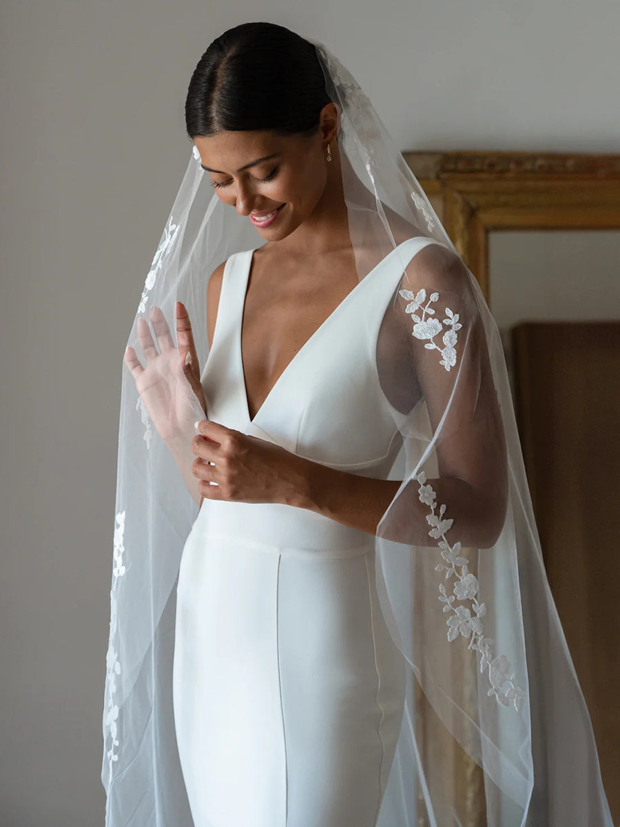 Deep V-Neck Sleeveless Low-V Back Mermaid Wedding Dress with Slit and Train
