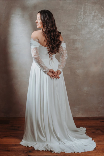 Vestido de novia de manga larga con encaje y hombros descubiertos