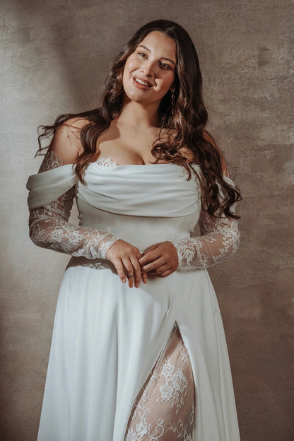 Vestido de novia de manga larga con encaje y hombros descubiertos