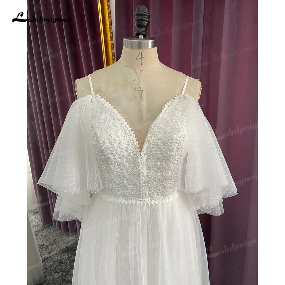 Vestido de novia con apliques de encaje y flores de talla grande con abertura lateral